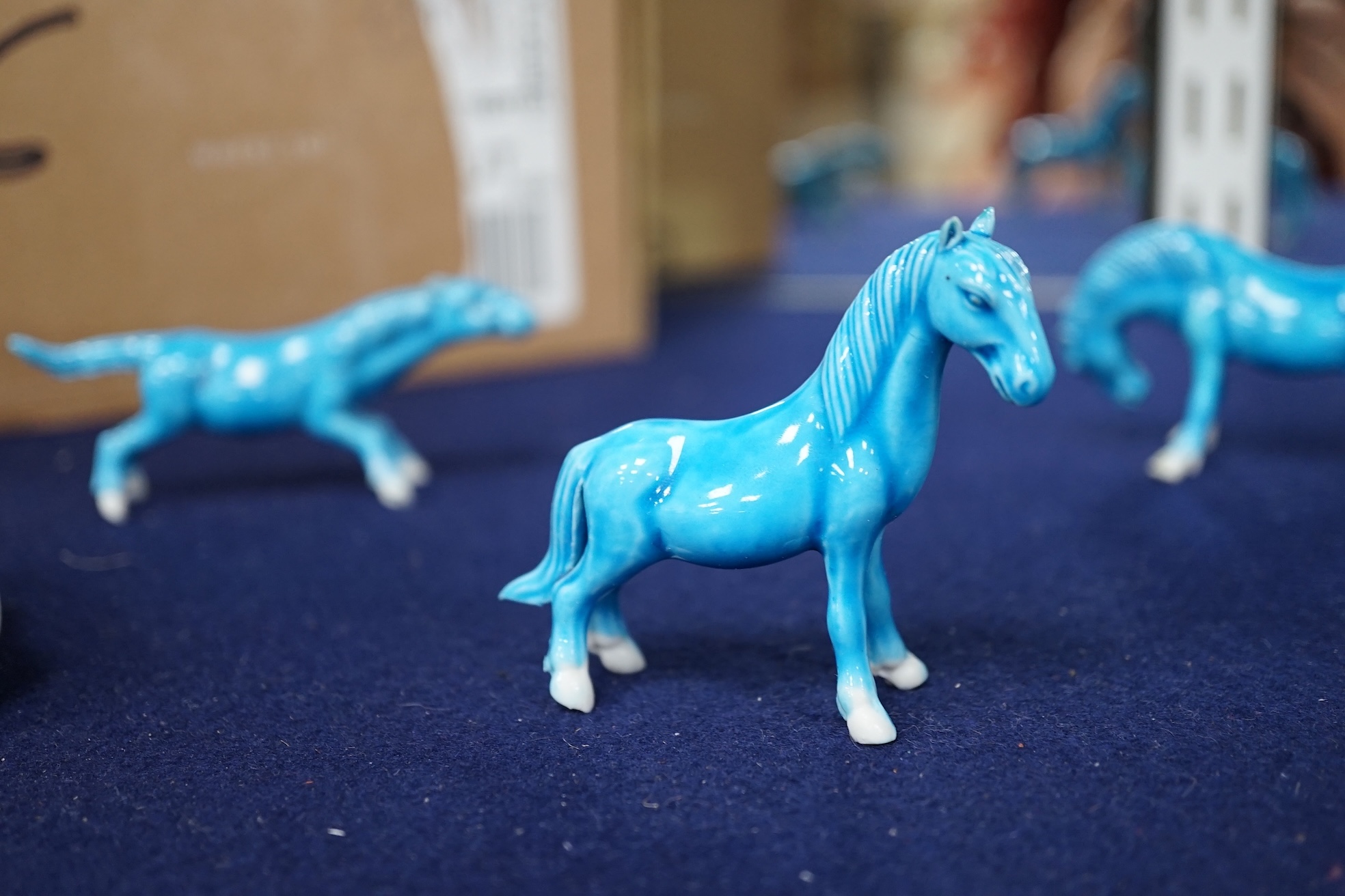 A group of Chinese turquoise glazed models of horses, three ceramic and one enamel scent bottle, tallest scent bottle 8cm high (12). Condition - one broken leg on one horse